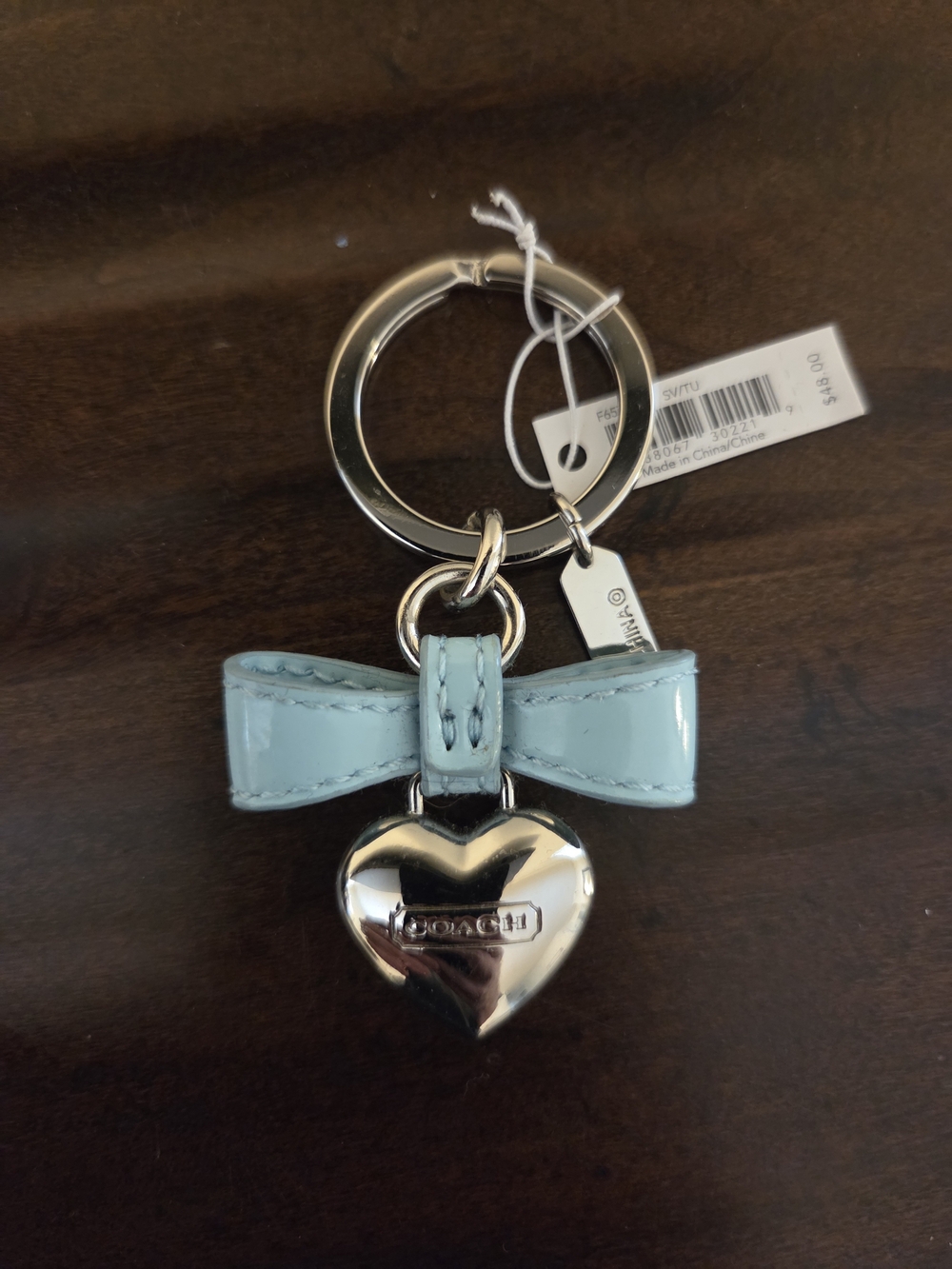 New COACH Light Blue Patent Leather Bow Keychain with Silver Heart Charm